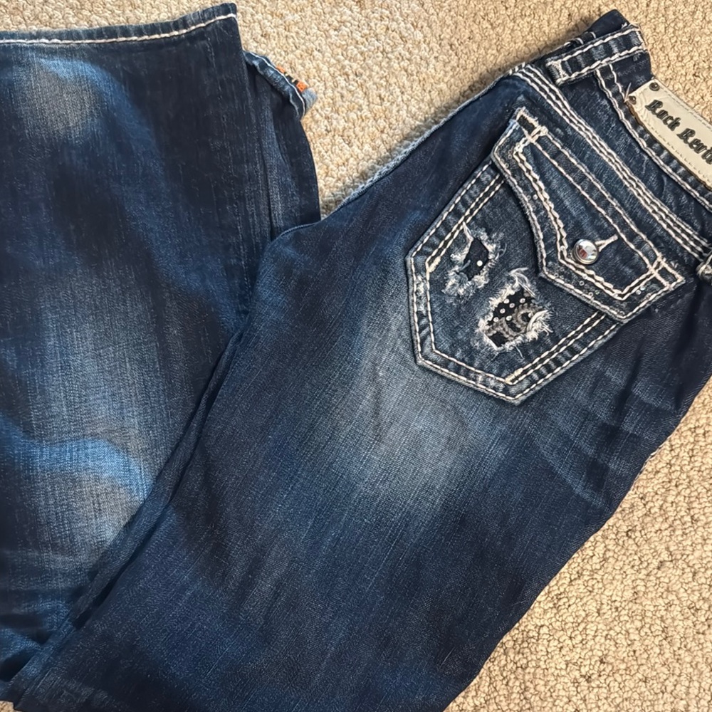Dark Wash Jeans with Distressed Detailing
